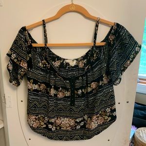 Off the shoulder, black top
